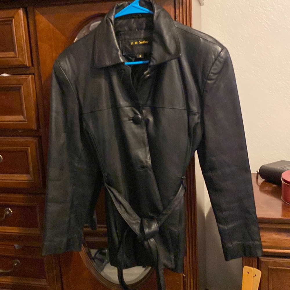 Women’s black soft leather pant coat.